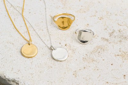 A classic everyday medallion necklace. Simple and feminine with a fluid feel. Inspired by the artist Georgia O'Keeffe. Georgia Necklace by Amanda Hunt