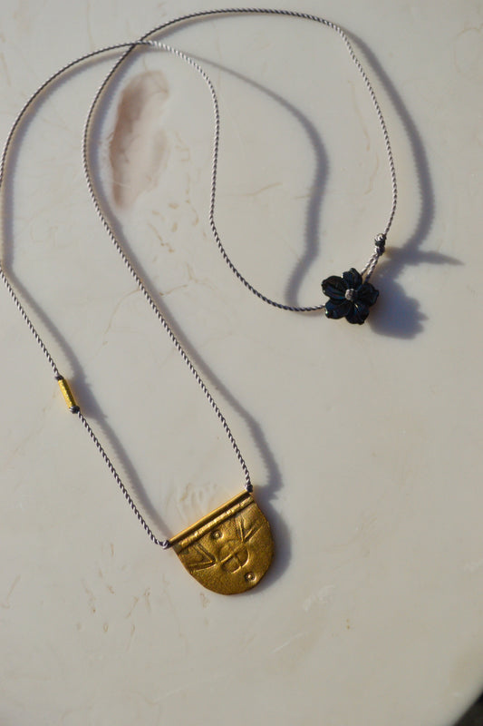 riversong jewelry / Talisman Collection: Born from a long standing partnership with two Turkish artists, each piece is hand-stamped with antique imagery.


A symbol of world citizenry to be worn for personal protection and happy travels. Intended for daily wear and to gently form a time worn patina.