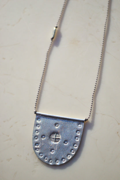 riversong jewelry / riversong jewelry / Talisman Collection: Born from a long standing partnership with two Turkish artists, each piece is hand-stamped with antique imagery.


A symbol of world citizenry to be worn for personal protection and happy travels. Intended for daily wear and to gently form a time worn patina.