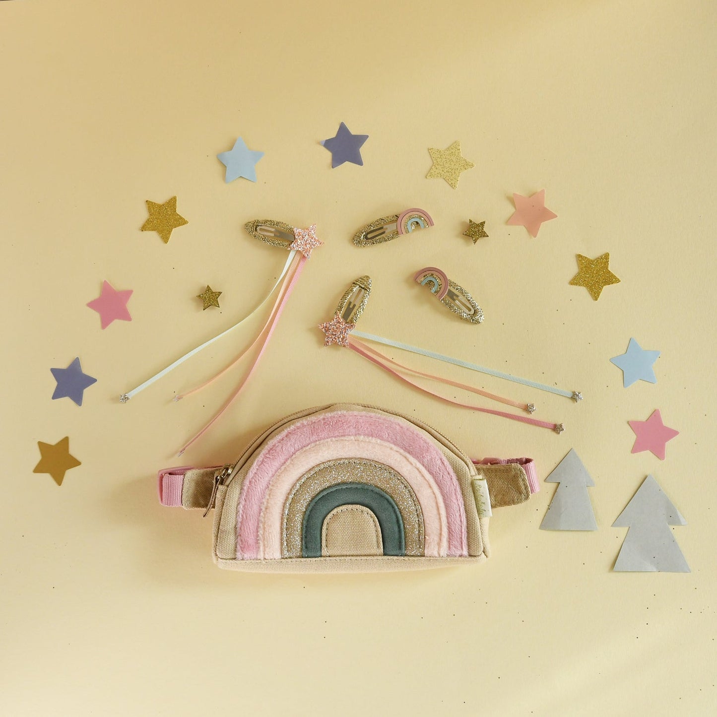 Shimmer and shine with this gorgeous bum bag! In a palette of pastels with shimmering gold glitter and soft velvet, this sweet bag is fully lined with foil printed star fabric, a zip closure, adjustable strap and belt loop. / rainbow bum bag rockahula