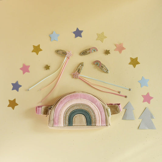 Shimmer and shine with this gorgeous bum bag! In a palette of pastels with shimmering gold glitter and soft velvet, this sweet bag is fully lined with foil printed star fabric, a zip closure, adjustable strap and belt loop. / rainbow bum bag rockahula