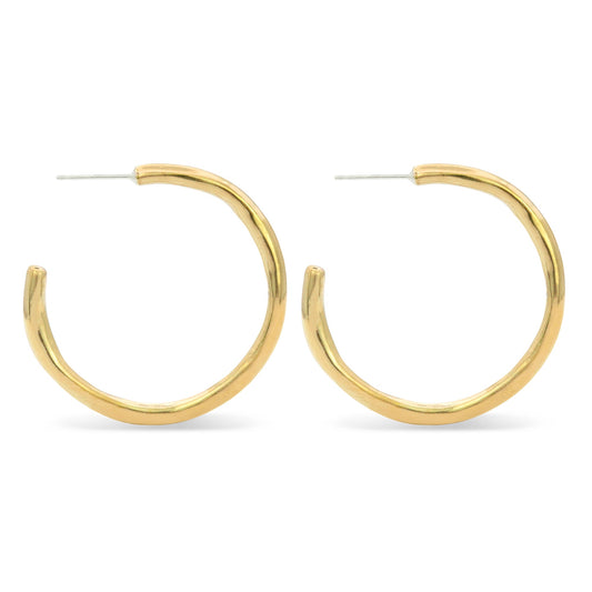 arroyo hoops - An organic shaped hoop inspired by the arroyos of the high desert.    Handcast in sterling silver or bronze by Amanda Hunt.