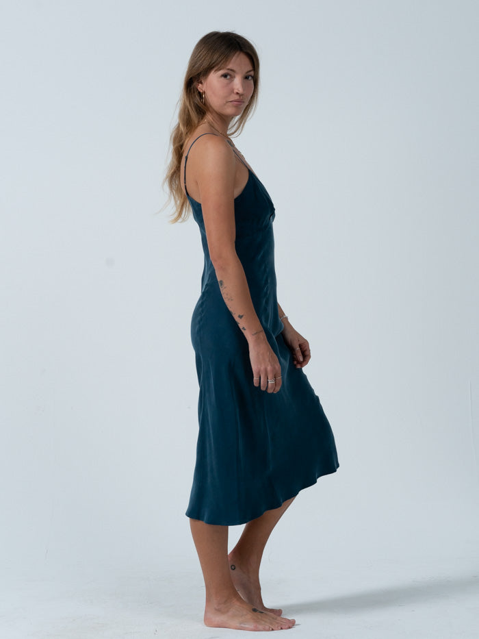 The Chelsea slip dress is here to honor your femme side with its flattering shape. Or don't, and grunge it down with some chunky boots and a vintage tee, how ever you want to wear it we think you'll look like great in this dress. Designed in Byron Bay, Australia.