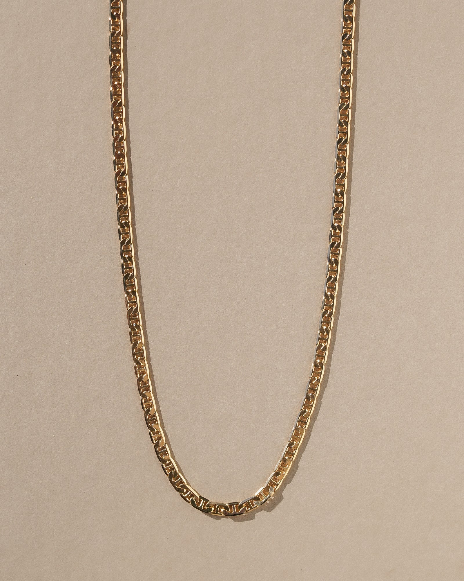 A simple braided chain intended to provide a ring of protection and luck when worn. 18k gold filled chain. Handmade in the Santa Cruz Mountains.
