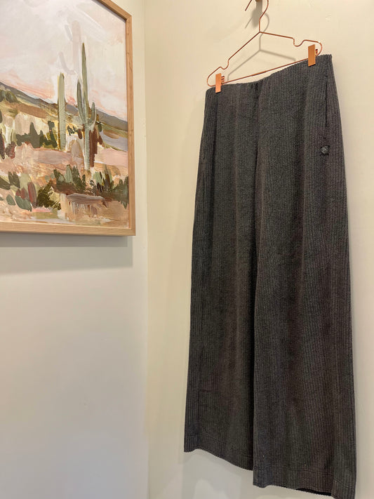 70’s inspired terry drop needle rib pull-on pant with an elastic waist band and a wide, flowy leg.