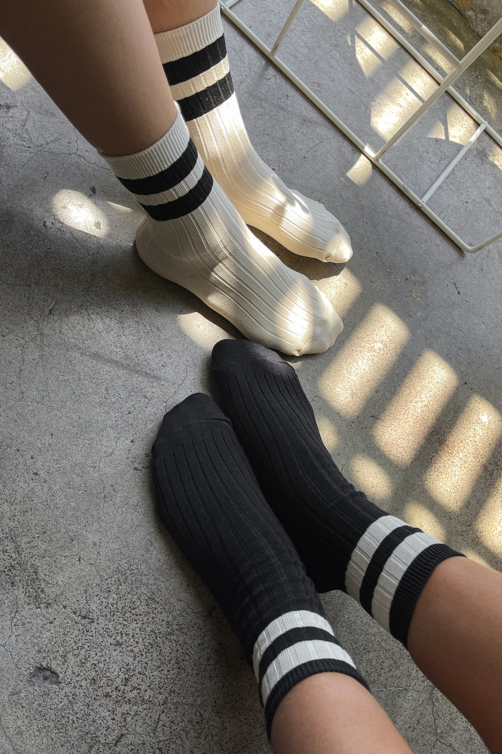Her Varsity Socks is a varsity striped version of Le Bon's OG Her Socks which are classically ribbed, perfect height, cotton blend durable, chic go to socks. Add an understated sporty touch to any look with this bold stripe contrast version of Her Socks.