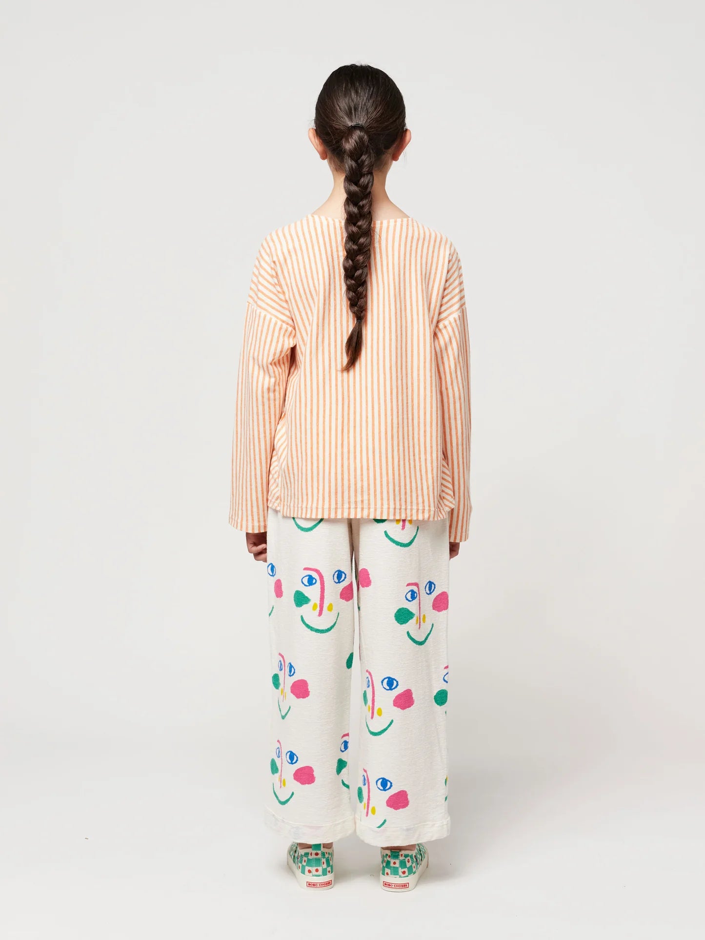 Smiling Mask All Over Jogging Pants by Bobo Choses.