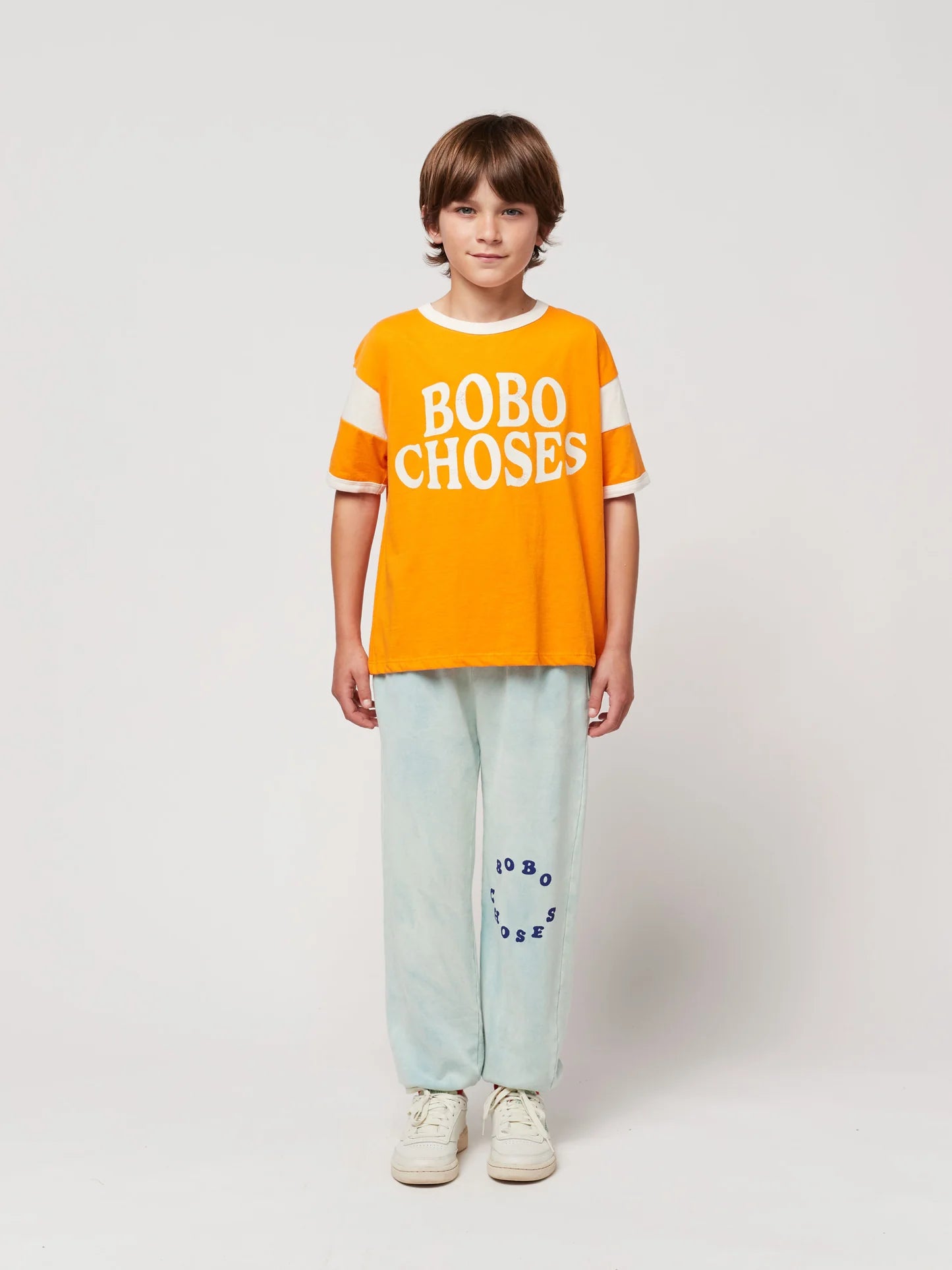 Bobo Choses Circle Jogging Pants by Bobo Choses. Light blue washed, jogger style pants featuring Bobo Choses circle decal.