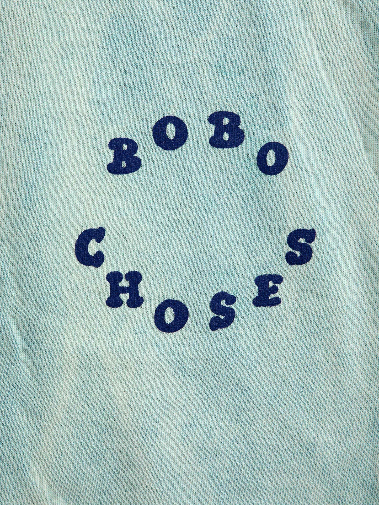 Bobo Choses Circle Jogging Pants by Bobo Choses. Light blue washed, jogger style pants featuring Bobo Choses circle decal.