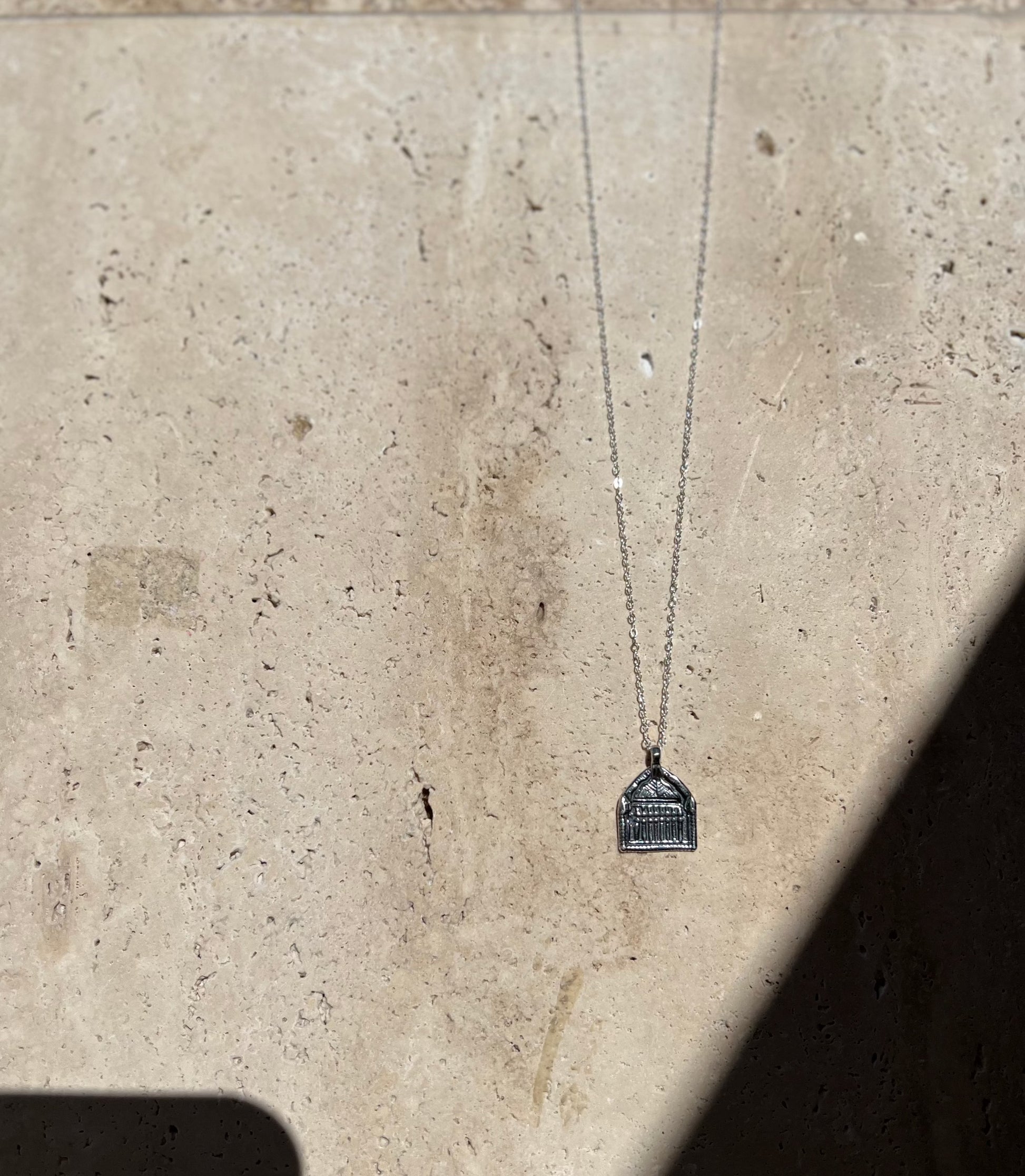 Delicate light weight hand carved charm necklace designed to represent a door, passageway or opportunity. Recycled brass pendant coated in a thick layer of high grade 14k gold or sterling silver. Handmade in the Santa Cruz Mountains.