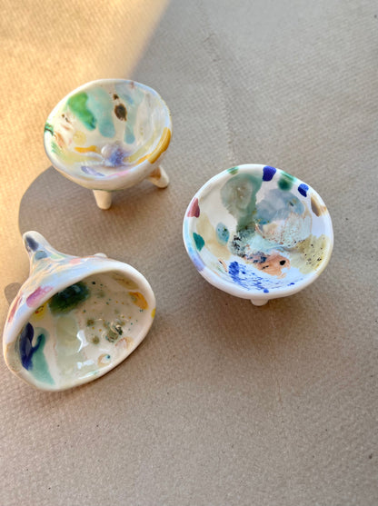 Curious Clay's best-selling small-sized ceramic tripod, but with a twist! Splattered and dotted with really fun sporadic colors. Uses include seasalt pinch dish, ring/precious item dish, air plant home, etc. Use your imagination and enjoy!