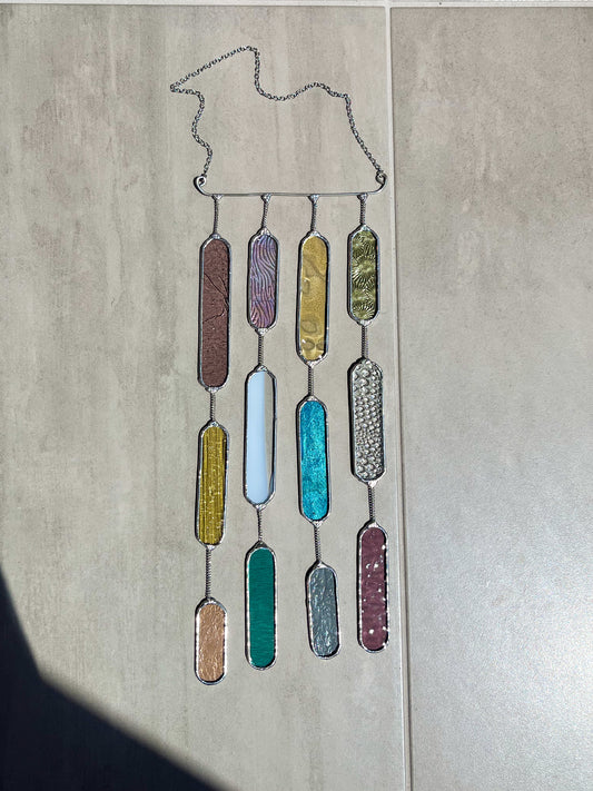 Handmade stained glass pendant with three elements attached by a silver chain. You can hang this panel in a window, on the wall as decor or even an outside patio. Custom made for Thread Spun by Culotta Creations.