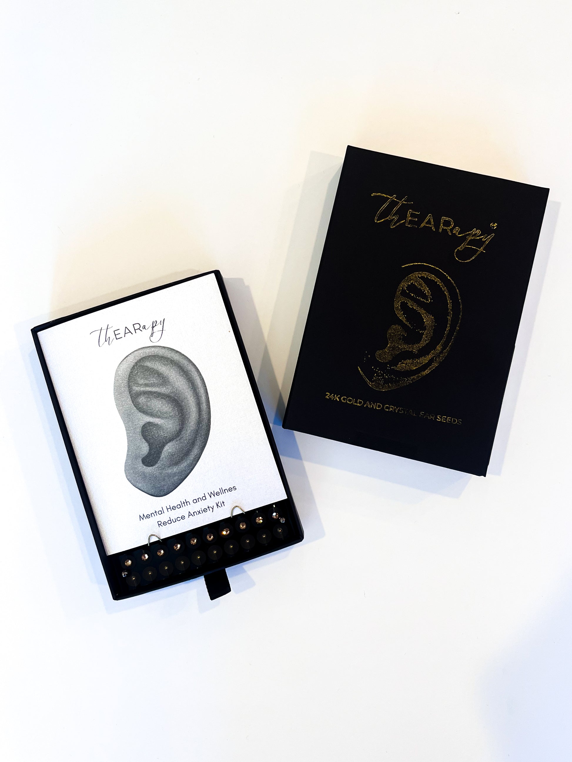 These ear seeds are made with 24k gold plated metal pellets with beautiful gold crystals on top. The light continuous pressure on the acupoints of the outer ear stimulates a response in the nervous system towards health. Each kit includes enough seeds for four treatments and detailed how-to instructions.