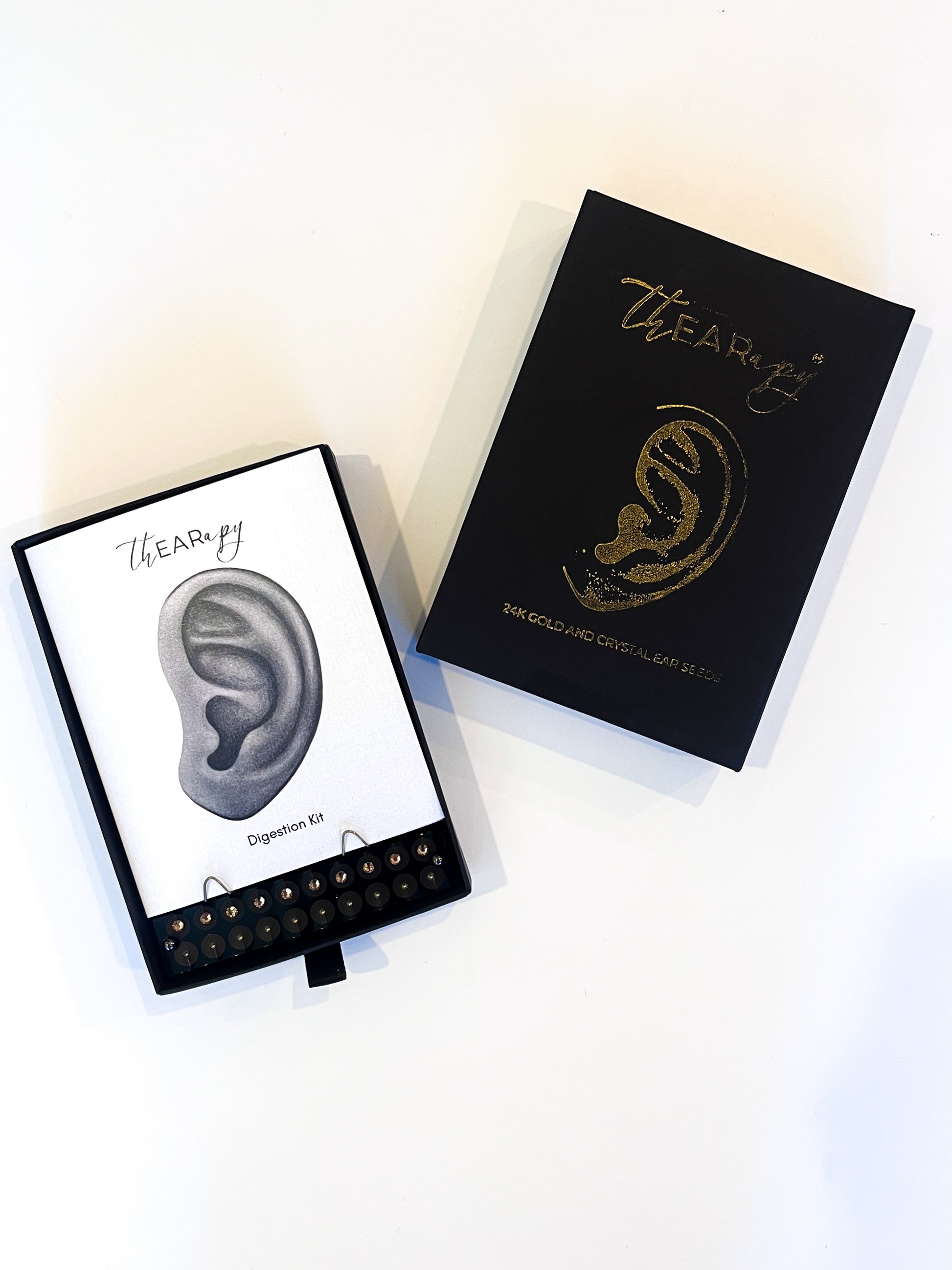 These ear seeds are made with 24k gold plated metal pellets with beautiful gold crystals on top. The light continuous pressure on the acupoints of the outer ear stimulates a response in the nervous system towards health. Each kit includes enough seeds for four treatments and detailed how-to instructions.