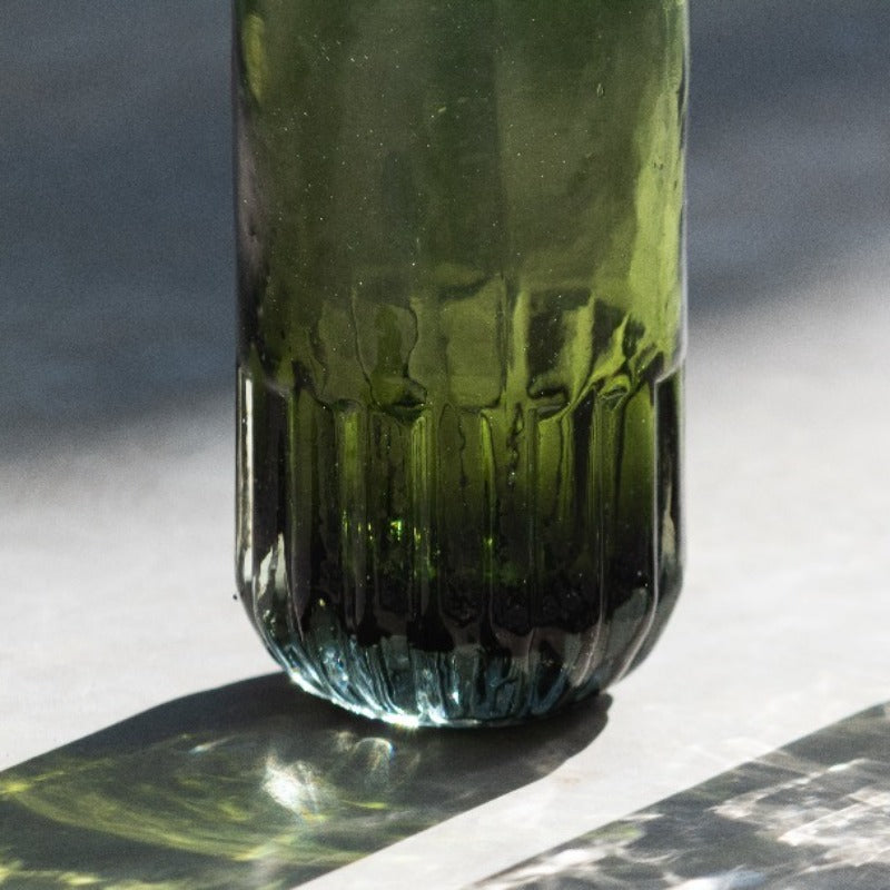 Where eco-friendliness meets contemporary beauty - This stunning green color is more than just a color; it reflects Maako's dedication to the environment, as it's crafted from green recycled bottles. Handmade in Mexico.