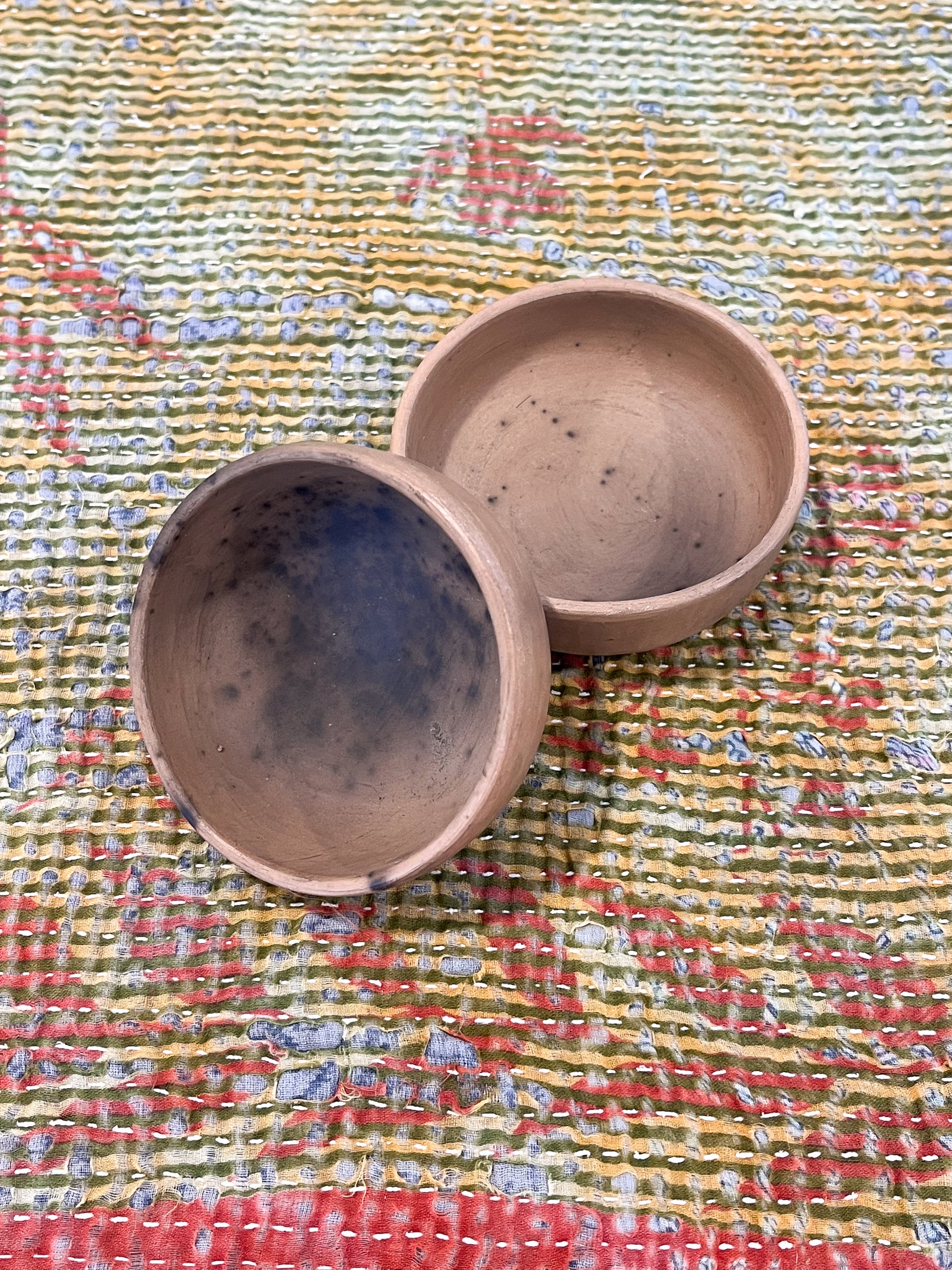 Set of 2 handmade bowls featuring one of a kind markings from the smoke firing process.  Ethically made in Mexico.