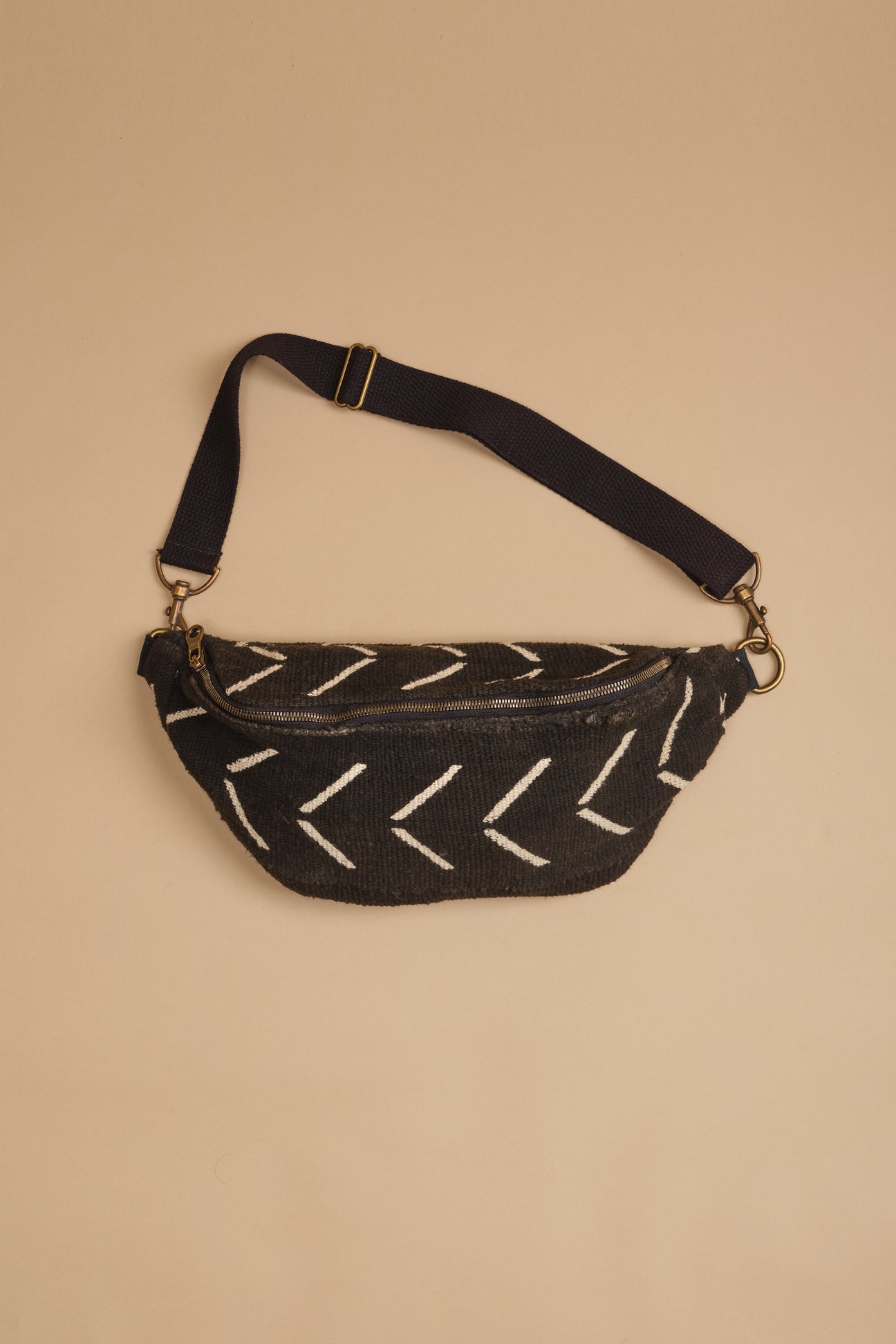 This slouchy sling is the perfect grab-and-go bag, big enough to carry all of your daily essentials and hands free to accompany you on all of your adventures and is perfect for travel. It's handmade with traditional African mud cloth and fully lined with natural canvas and two internal pockets for your essentials.