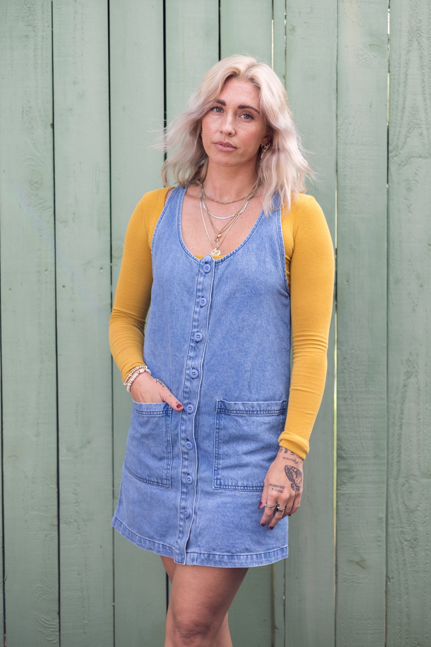 The button-front jumper morphed into a dress for when your legs want more sunshine. Made from a hemp & cotton blend.