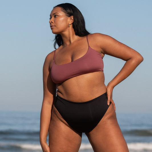 Is it a swim top? Is it a surf top? Is it a sports bra? Is it the best ever? Yes to all of the above. A scoop front, medium coverage bikini top built for smaller busts (A-C cup). One of Left on Friday's best selling tops, for good reason, with its insanely soft, smoothing coverage fabric.