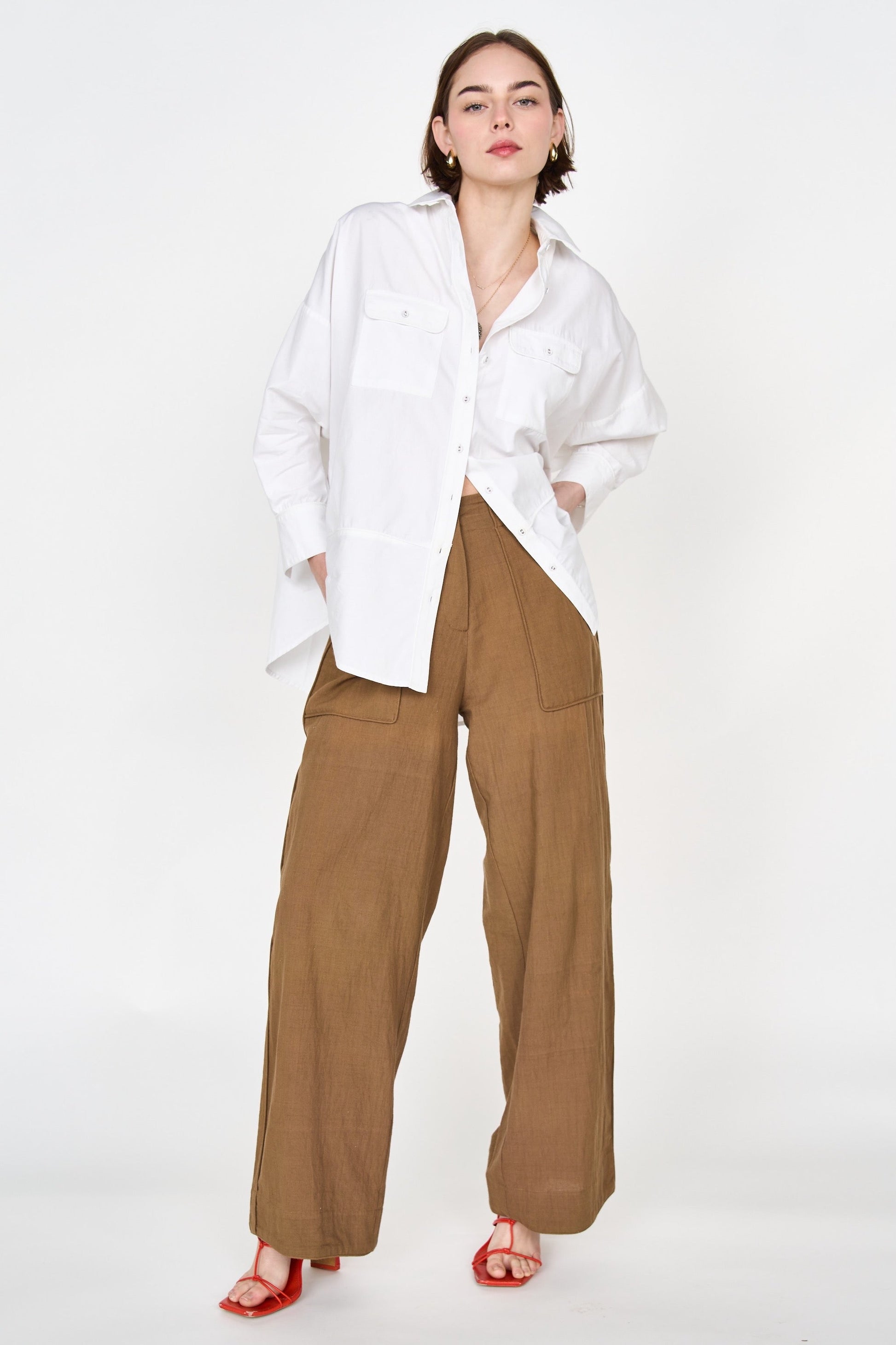 Mirth's best-selling tailored Tivot Pant is now available in a rich, new color for fall. The cotton fabric is hand loomed using hand spun yarns, giving it a textural feel. Ethically made in India.