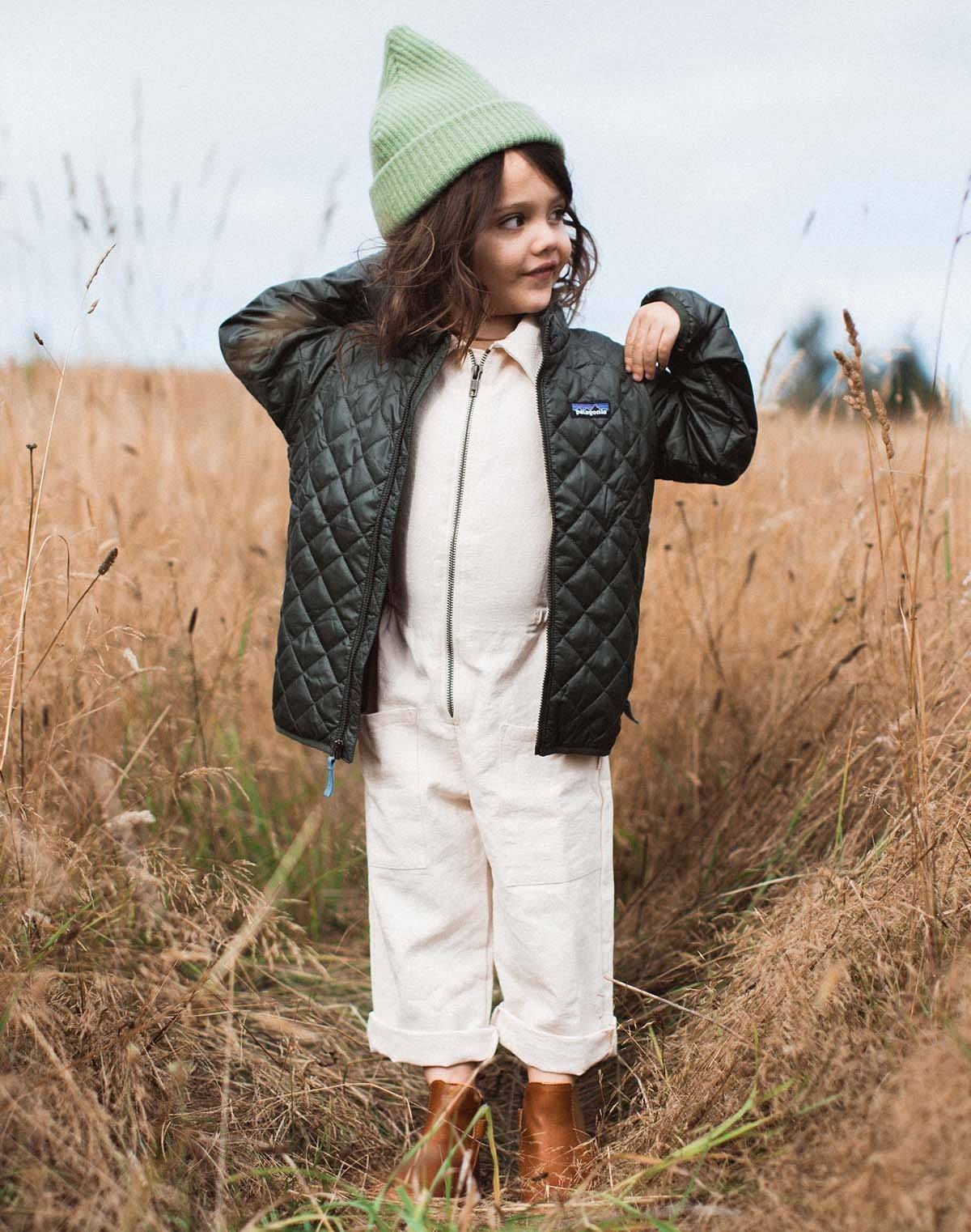 Noble's Utility Suit is durable enough to hold up to your child’s play, but also soft enough to be against their delicate skin all day. Made in Peru with GOTS certified organic Pima cotton canvas.