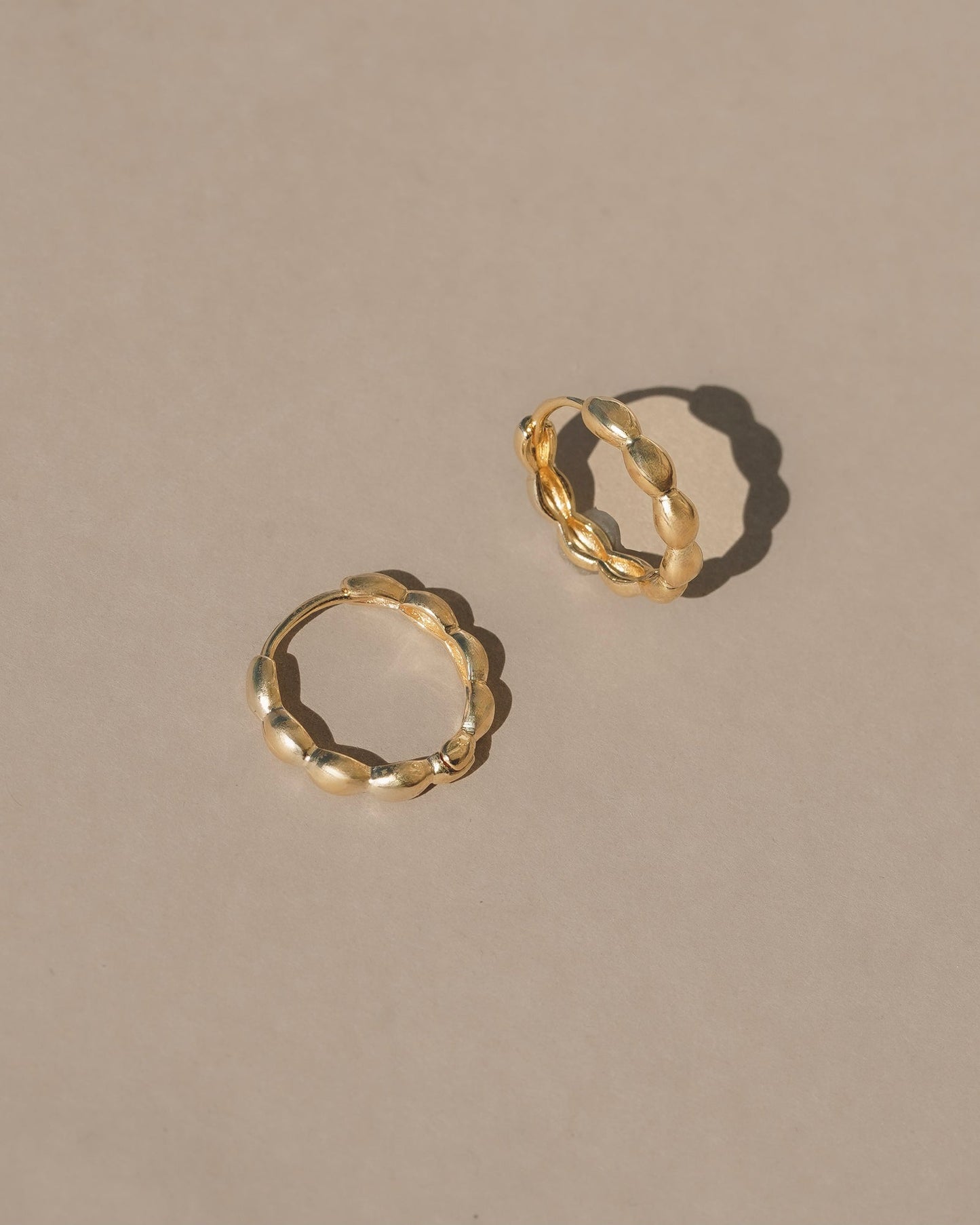 14k gold vermeil petal earrings / Simple floral inspired hollow hinged hoops, light weight every day comfort and organic ease.  Handmade in the Santa Cruz mountains.
