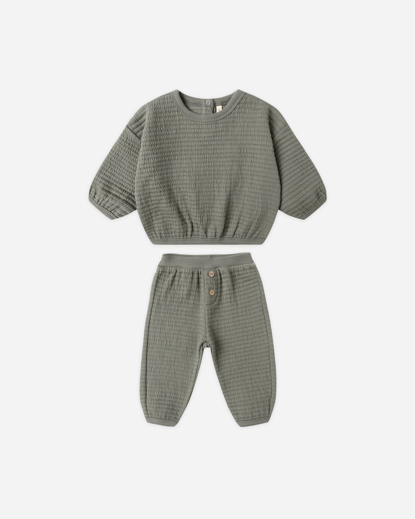 Green checkered outfit with top and pants on a white background. quincy mae textured sweat set