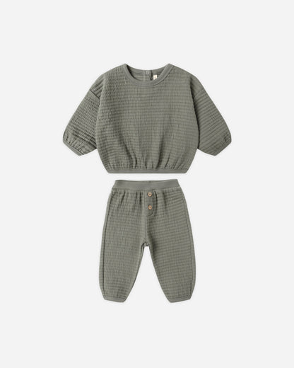Green checkered outfit with top and pants on a white background. quincy mae textured sweat set
