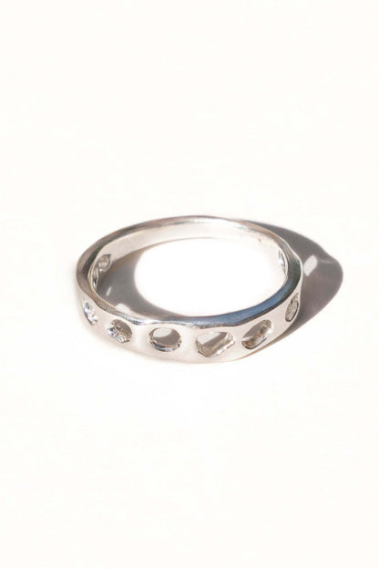 Handmade sterling silver ring on white background made by Moneh Brisel in Southern California