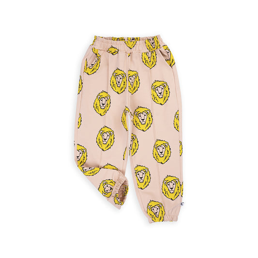 Tan based jogger style sweatpants with a playful lion print.Ethically produced, colorful and fun with an eye towards comfort, style and joy. Modern and sustainable kids clothing by CarlijnQ of the Netherlands.