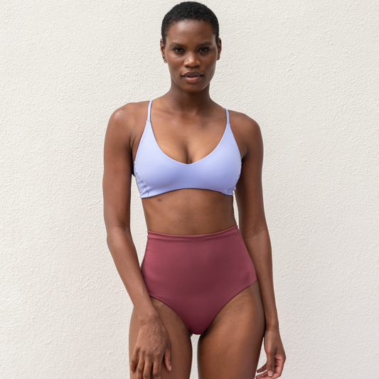 Dive in - these lux bottoms hug you in, while still showing just enough cheek to turn heads. A high waisted swimsuit bottom with a medium cut leg and medium bum coverage. One of Left on Friday's best selling bottoms, for good reason, with its insanely soft, smoothing coverage fabric.