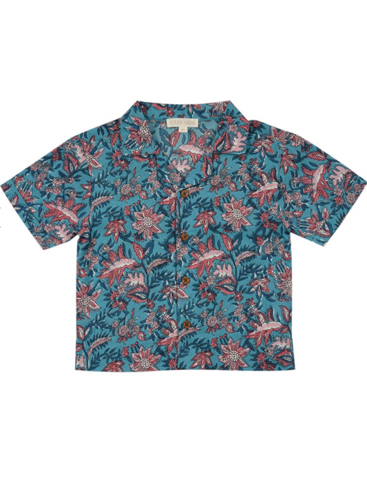 A Hawaiian-inspired short-sleeved cotton veil shirt with an all over print. Made with 100% organic cotton. Louise misha alov shirt in teal garden of eden.