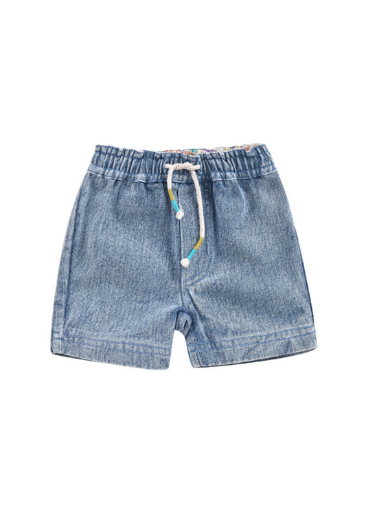 Light denim Bermuda shorts with an elasticized waist and drawstring with two-tone embroidered end. Made with 100% organic cotton. Louise misha obiki shorts in stone blue.