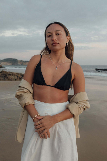 These earrings are inspired by the way seaweed blades gracefully sway underwater.  Hand carved and cast with a high polished mirror finish. Available in solid brass or sterling silver.