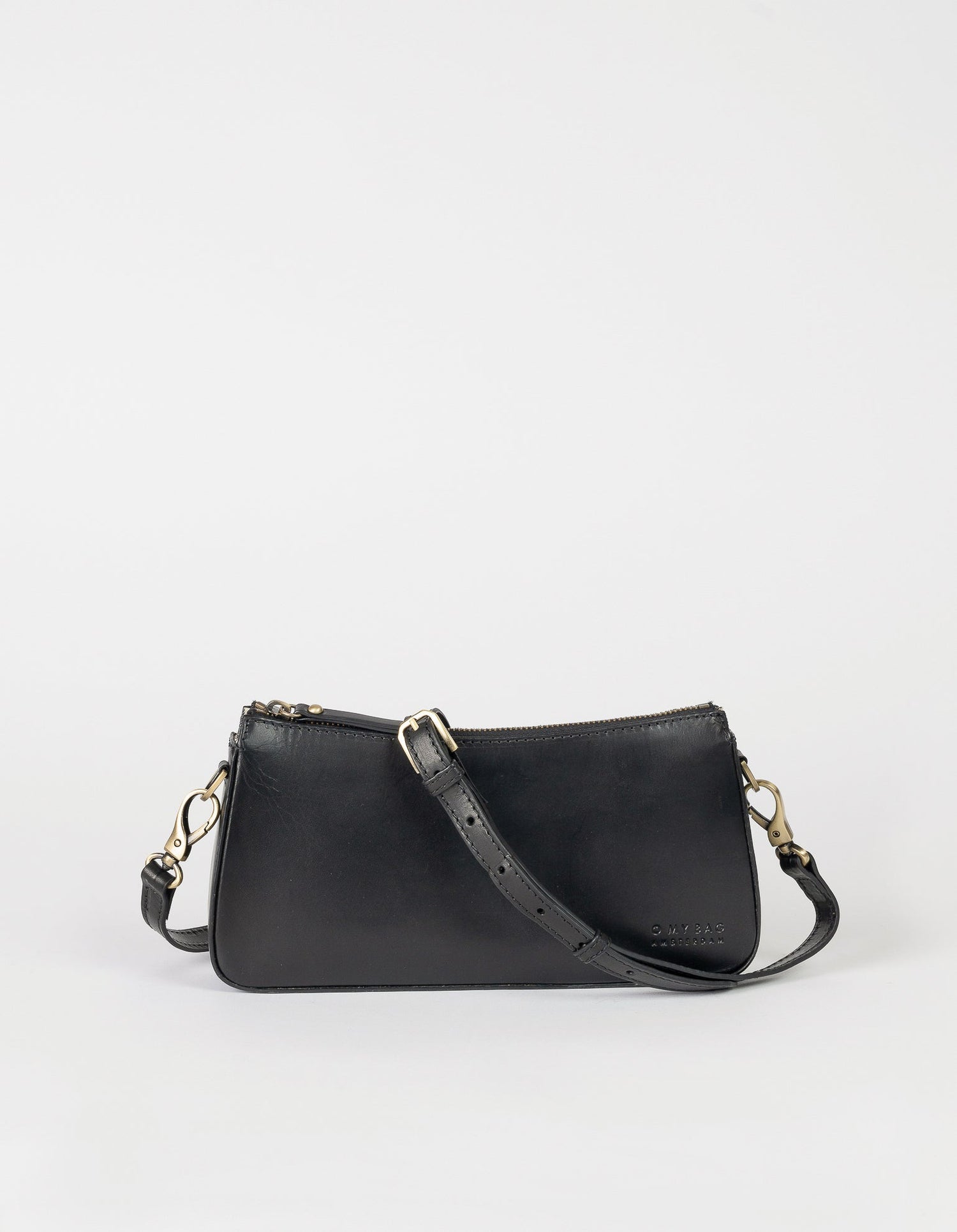 A bag that gives you an irreplaceable look and feel of a fun night out? Here she is! Small but mighty, Taylor has a compact and convenient design optimized to fit your most important belongings. She comes with one short strap and one long adjustable strap for a crossbody look. Made in India.