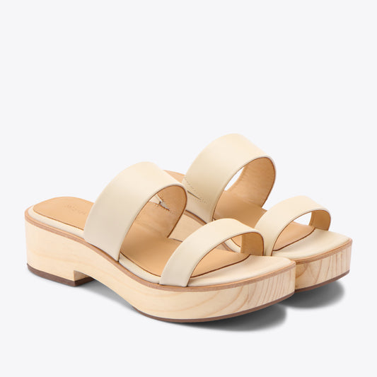 Nisolo Ellie All Day Clog Sandal -  Proof that minimal doesn’t have to mean boring. She’s casual yet sophisticated, and comfortable enough to go anywhere life takes you. These slip on leather clogs have lighweight with wooden soles & elastic for an adaptable fit.