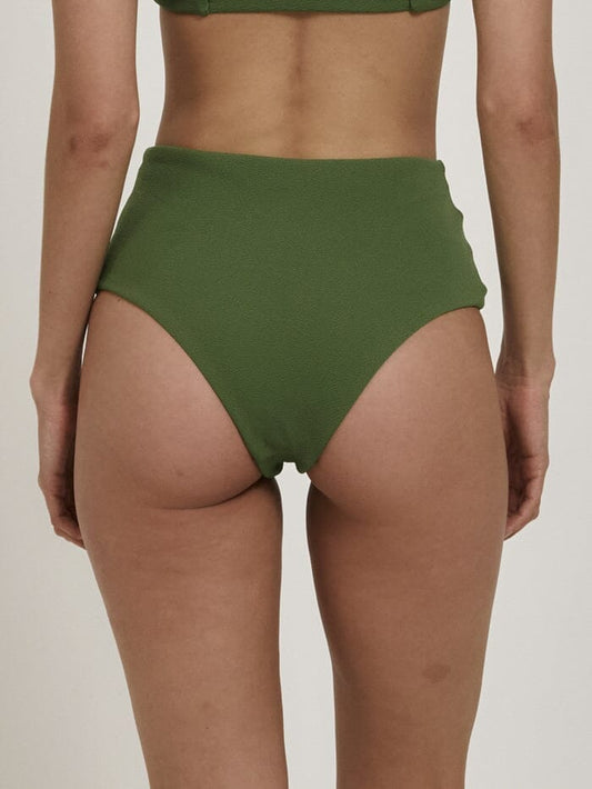 Made from eco-friendly recycled materials, the Adira High Waisted Bikini Bottoms offers an eco-conscious choice without compromising on style, so you can feel just as good as you look! Designed in Byron Bay, Australia.