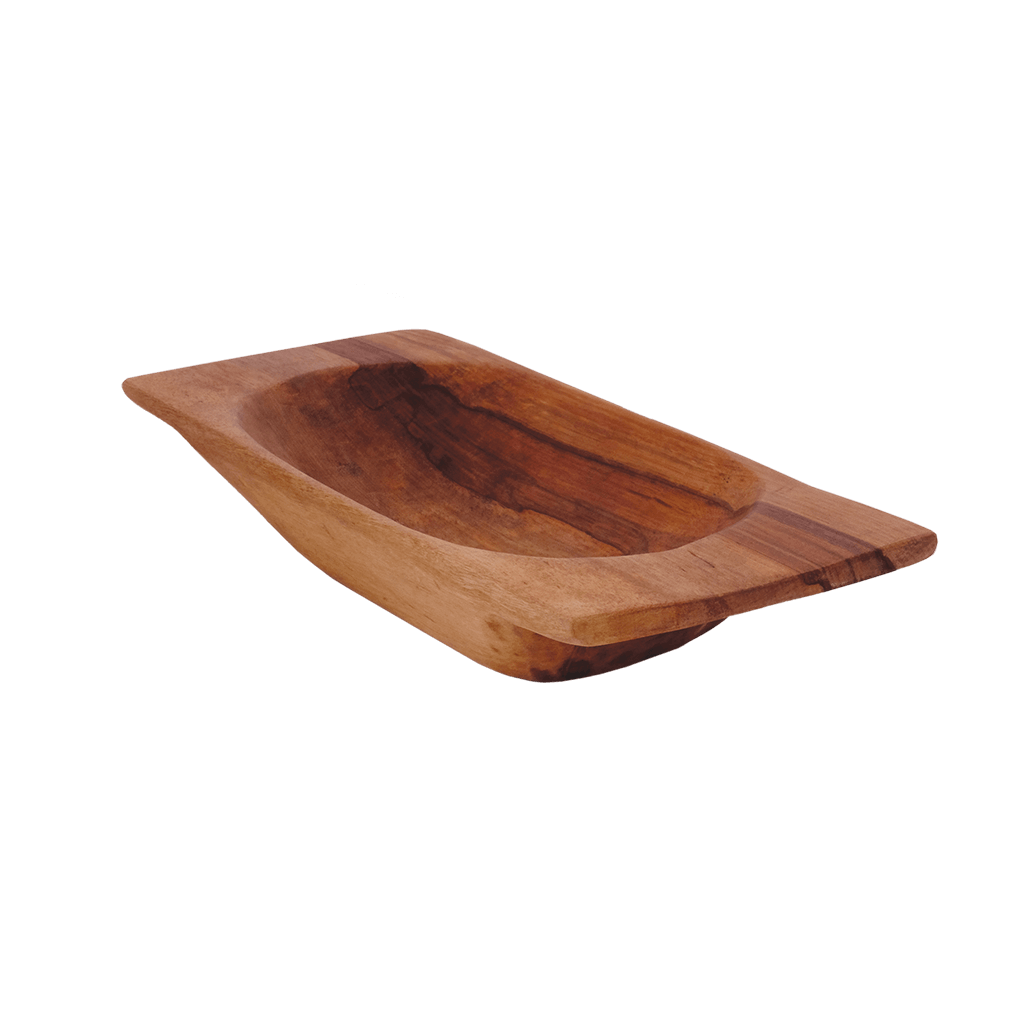 Hand carved from a single block of wood, the trencher is a classic form. Made by indigenous Yanesha artisans in the Amazon in Peru. Each trencher is heirloom quality, and has rich grain and natural carving marks.