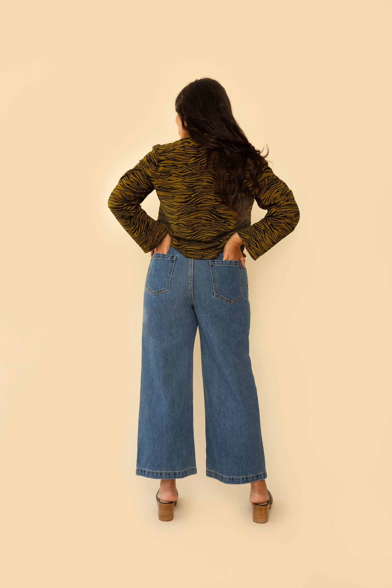 Whimsy + Row Flora Pants in Dark Denim. High rise, wide leg pant with a chunky button - what more could you ask for? This classic pair of jeans is also made from 100% organic cotton. Ethically and sustainably-made for every season.