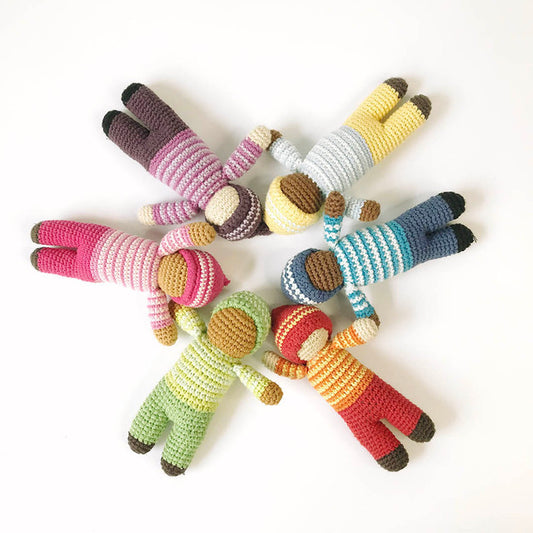 Perfect for little arms to cuddle and hands to hold. Found playing in a lush garden filled with plants, these Pixie Rattle dolls are ready to frolic through a world of imagination with your little one. Handmade with colorful and soft cotton yarn, they make a gentle jingle when shaken.