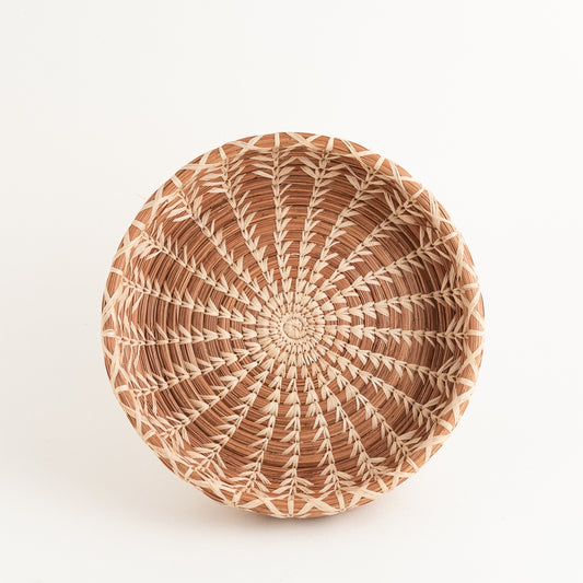Handwoven Ceila Basket designed by Mayan Hands artisan partners in La Fe, this fragrant basket also enhances the lives of the women who created it.