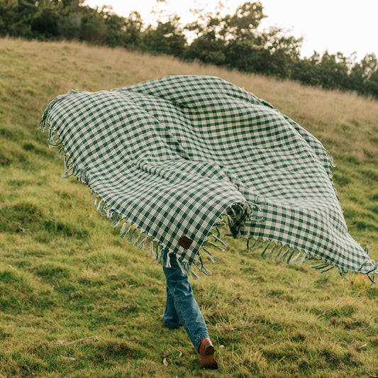slowtide palaka turkish blanket Crafted from ultra-lightweight Turkish-style chambray fabric, this blanket gets softer with each wash, ensuring a gentle and cozy feel every time. 210 GSM.
