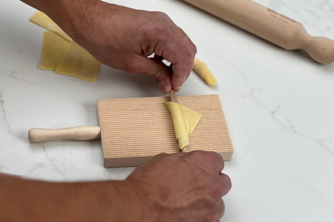 A traditional Italian board is used to shape the dough (Garganelli) or potato dough (Gnocchi) into small dumplings.

Handcrafted from premium solid beechwood, this versatile tool creates impeccable pasta shapes and textures, enhancing sauce adherence.