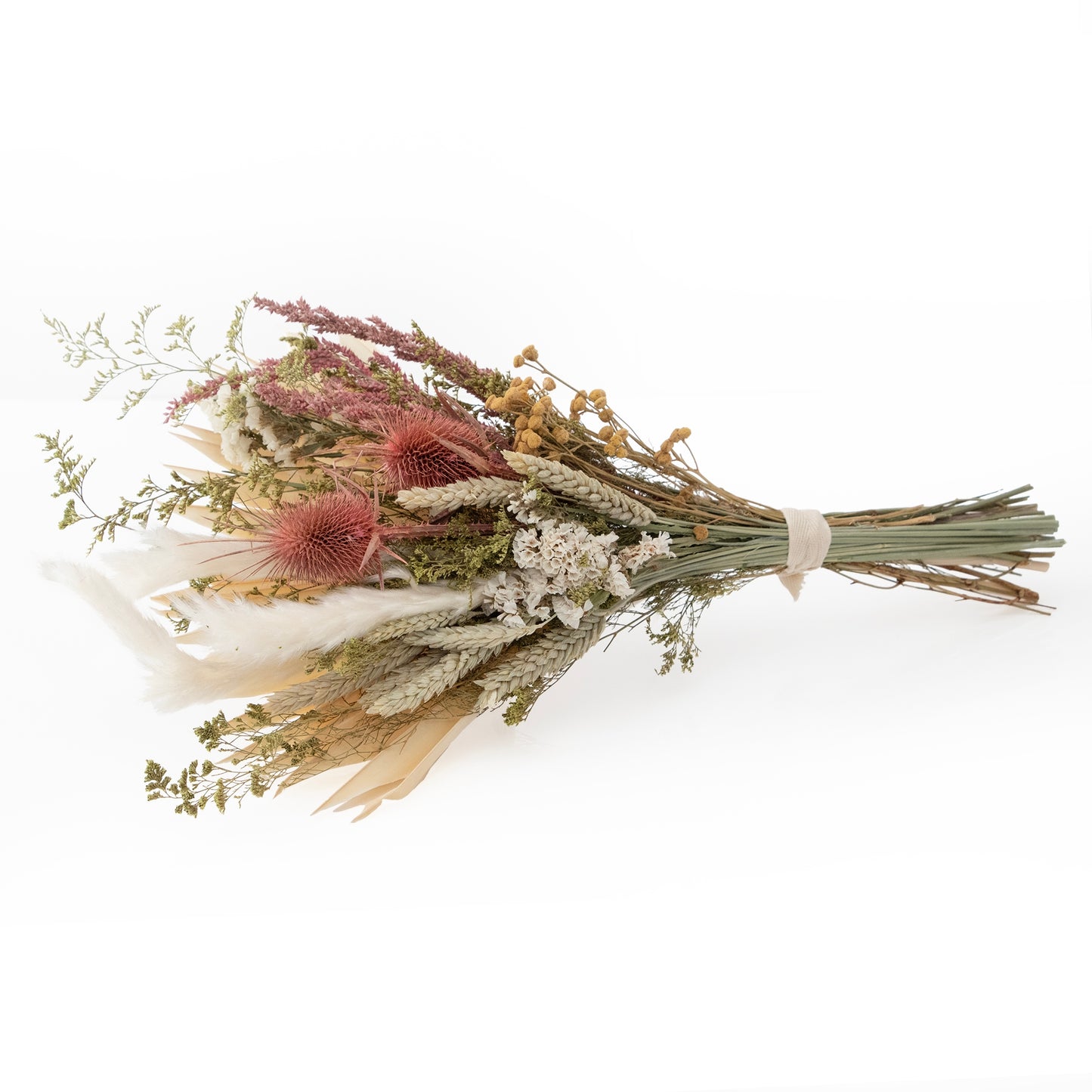 Andaluca’s floral team designed this beautiful bouquet using a mix of wildflowers, grains, bunny tails, and palm leaf to create this lush and opulent bouquet arrangement. 