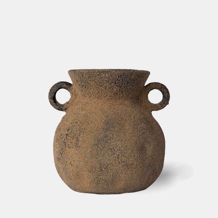 Featuring a distinctive look, the binx vase exudes an old time feel. A rustic finish with unique imprints, it adds a charming aesthetic. Each individual piece is handmade with love in Tonala, Mexico.