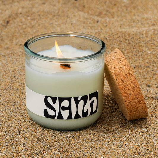 often wander california element candle sand - Imagine walking on a foggy early morning on the beach...  Unearth your senses with notes of dirt, beachwood, sea grass, and salt.  Clean and slow burning, these 9 ounce smooth and creamy soy candles have a 60 hour burn time. vegan, essential oils, recycled glass, bpa free wick, paraben free