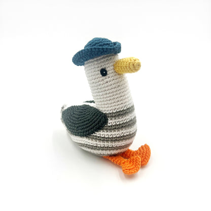 This hand crocheted rattle is designed to delight little hands and engage curious minds. The gentle rattle sound encourages sensory exploration while the soft, tactile textures make it perfect for grasping, shaking, and cuddling.