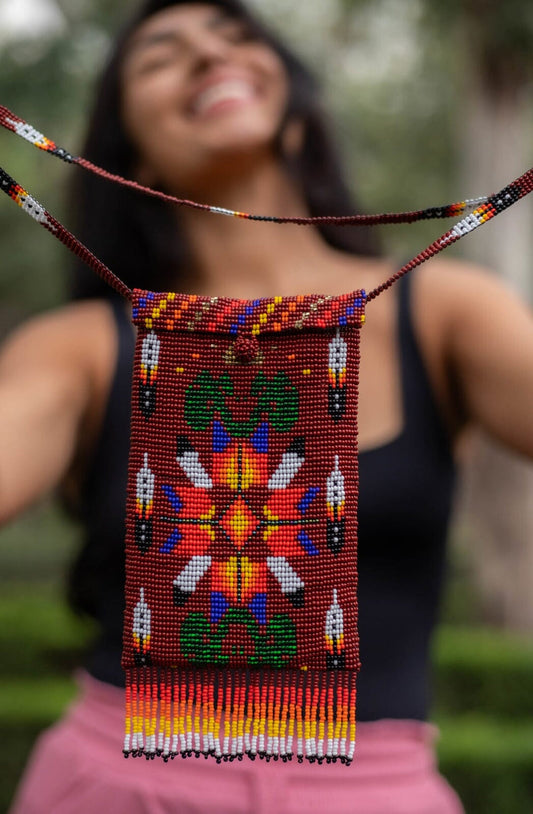 Hand beaded purse is a one-of-a-kind accessory - majestic, bold, and beautiful. Handmade in Guatemala with Preciosa Ornela Beads.