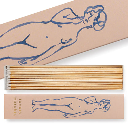 Matchbox with matches and matching lid featuring a stylized nude figure on a beige background. Archivist Gallery Long Matches 