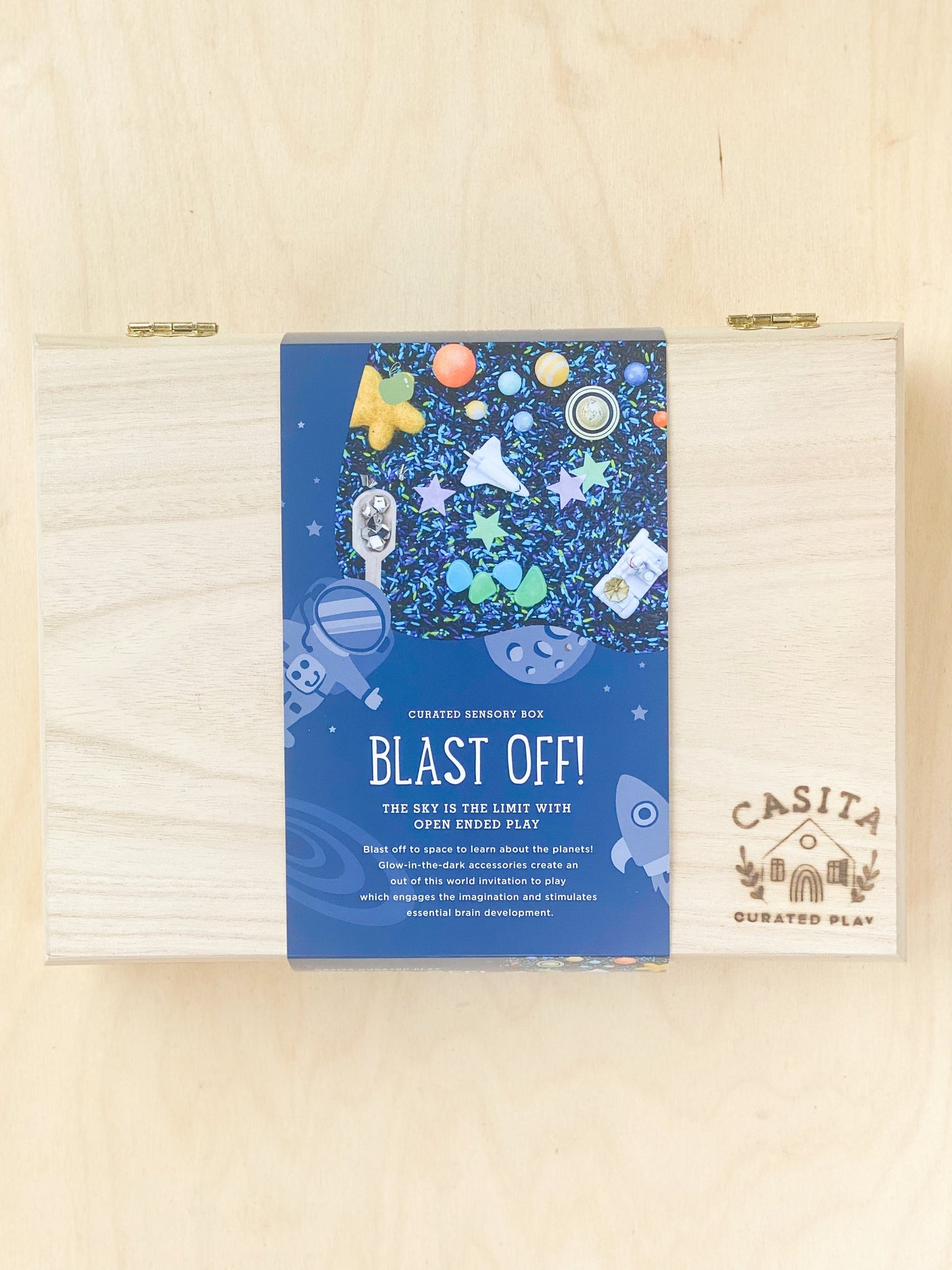 casita curated play / Blast off to space to learn about the planets - Glow-in-the-dark accessories create an out of this world invitation to play! Includes a full planet set, surprise space figurines, felt star, wooden scoop, and glow-in-the-dark rocks & stars.
